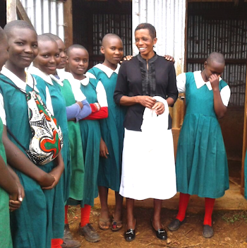 SAG Kit Distribution image showing Gikumbo Primary School girls receiving 30 kits in Karatina, Kenya on Sep 15, 2017