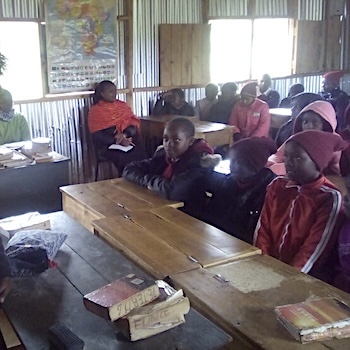 SAG Kit Distribution image showing Bright Star School girls receiving 30 kits in Mwea, Kenya on Sep 15, 2017