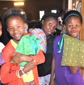 SAG Kit Distribution image showing Reya Gona Area Girls girls receiving 220 kits in Tembisa, South Africa on Sep 27, 2017