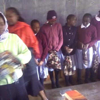 SAG Kit Distribution image showing Kihatha Primary School girls receiving 40 kits in Niganjo, Kenya on Oct 31, 2017