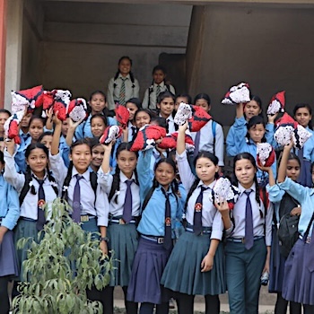 SAG Kit Distribution image showing One Heart Worldwide girls receiving 100 kits in Kathmandu, Nepal on Jun 30, 2017