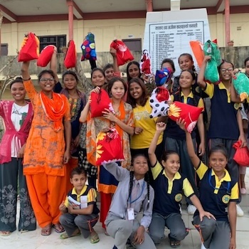 SAG Kit Distribution image showing Shanti Varsha Schools girls receiving 100 kits in Byas, Nepal on May 21, 2018