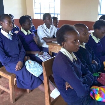SAG Kit Distribution image showing Irembu School girls receiving 70 kits in Kaharo, Kenya on May 24, 2018