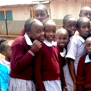 SAG Kit Distribution image showing Nyeri Farm School girls receiving 30 kits in Nyeri, Kenya on May 24, 2018