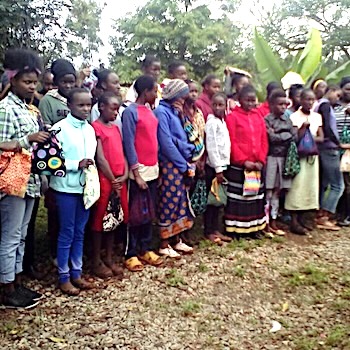 SAG Kit Distribution image showing Kiganjo Women girls receiving 150 kits in Kiganjo, Kenya on May 30, 2018