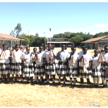 SAG Kit Distribution image showing Naro Moru School girls receiving 210 kits in Naro Moru, Kenya on Sep 1, 2018