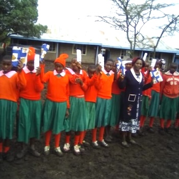 SAG Kit Distribution image showing Karima School girls receiving 32 kits in Karima, Kenya on May 5, 2019