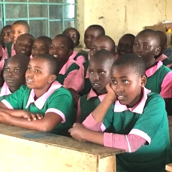 SAG Kit Distribution image showing Sirima Primary School girls receiving 33 kits in Sirima, Kenya on Jun 3, 2019