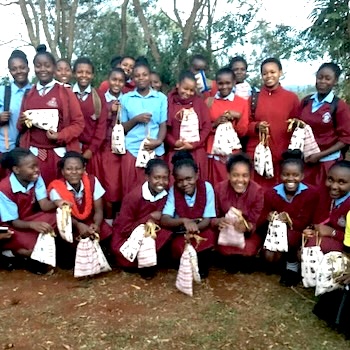 SAG Kit Distribution image showing Muhoya Secondary School girls receiving 84 kits in Muhoya, Kenya on Jun 20, 2019