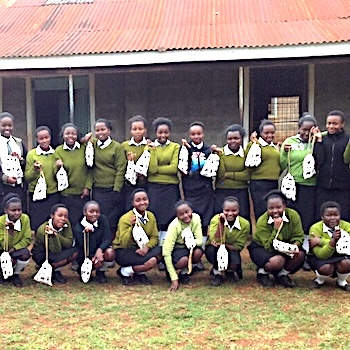 SAG Kit Distribution image showing Githage Secondary School girls receiving 50 kits in Githage, Kenya on Jul 29, 2019