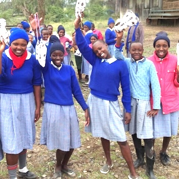 SAG Kit Distribution image showing Tharua Primary School girls receiving 106 kits in Tharua, Kenya on Jul 31, 2019