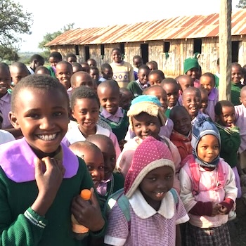 SAG Kit Distribution image showing Muthangira Primary School girls receiving 49 kits in Muthangira, Kenya on Jul 31, 2019