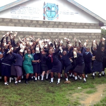 SAG Kit Distribution image showing Nyaribo Secondary School girls receiving 123 kits in Nyaribo, Kenya on Oct 18, 2019