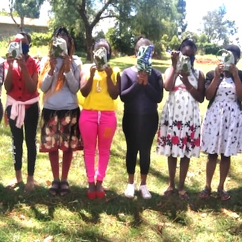 SAG Kit Distribution image showing Mwenji School girls receiving 213 kits in Mwenji, Kenya on Oct 3, 2020