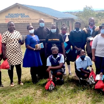 SAG Kit Distribution image showing Mukandamia Primary and Secondary Schools girls receiving 127 kits in Mukandamia, Kenya on Nov 6, 2020