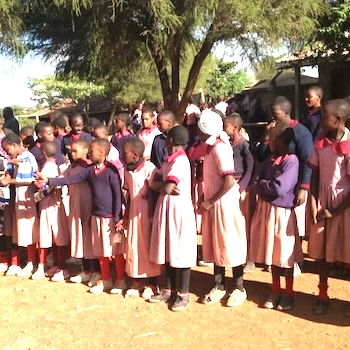 SAG Kit Distribution image showing Mugunda School girls receiving 421 kits in Mugunda, Kenya on Feb 20, 2020