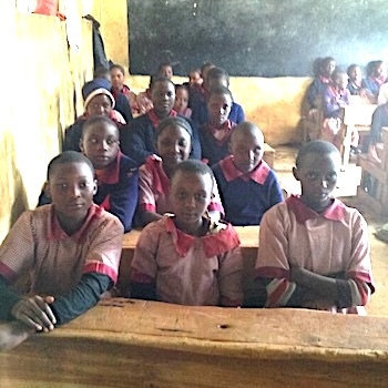 SAG Kit Distribution image showing Mugunda School girls receiving 421 kits in Mugunda, Kenya on Feb 20, 2020