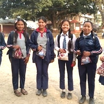 SAG Kit Distribution image showing Shree Saraswati School girls receiving 101 kits in Ghorahi, Nepal on Feb 26, 2020