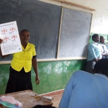 SAG Kit Distribution image showing Rware High School girls receiving 405 kits in Mathari, Kenya on Mar 6, 2020