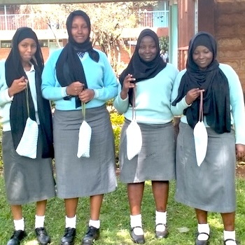 SAG Kit Distribution image showing Rware High School girls receiving 405 kits in Mathari, Kenya on Mar 6, 2020