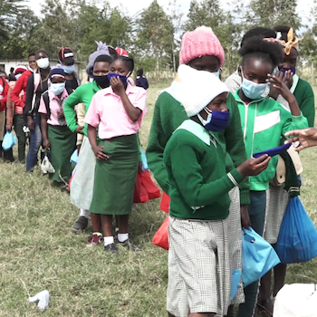 SAG Kit Distribution image showing St George + Gatunguru + Gatarakwa + Kimunyuru Schools girls receiving 333 kits in Kimunyuru, Kenya on Mar 18, 2020