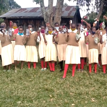 SAG Kit Distribution image showing Kiguru Primary School girls receiving 231 kits in Mweiga, Kenya on Feb 12, 2021