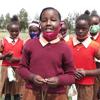 SAG Kit Distribution image showing Amboni Primary School girls receiving 325 kits in Mweiga, Kenya on Feb 25, 2021