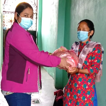 SAG Kit Distribution image showing Bangalachuli Women girls receiving 20 kits in Bangalachuli, Nepal on Jun 10, 2021