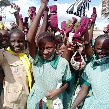 SAG Kit Distribution image showing Mwihoko School girls receiving 764 kits in Nairobi, Kenya on Jun 11, 2021