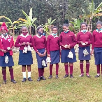 SAG Kit Distribution image showing Kiandai Primary School girls receiving 88 kits in Kiandai, Kenya on Aug 6, 2021