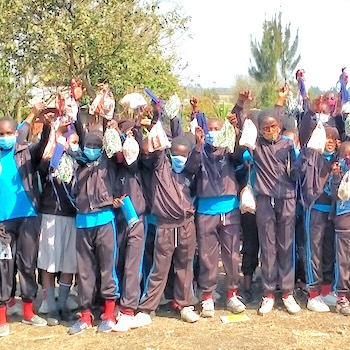SAG Kit Distribution image showing Laburra Primary School girls receiving 244 kits in Kieni West, Kenya on Sep 21, 2021
