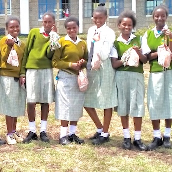 SAG Kit Distribution image showing Laburra Secondary School girls receiving 206 kits in Laburra, Kenya on Nov 4, 2021