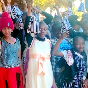 SAG Kit Distribution image showing Kaharo Primary School and Mukurweini Area Young Mothers girls receiving 480 kits in Mukurweini, Kenya on Jan 8, 2022