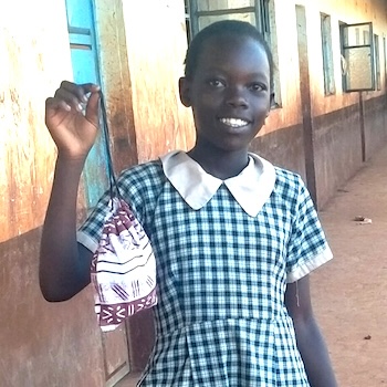 SAG Kit Distribution image showing Mukui & Area Primary Schools girls receiving 578 kits in Mukurweini, Kenya on Jan 8, 2022