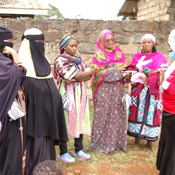 SAG Kit Distribution image showing Kingongo Mosque girls receiving 1232 kits in Kingongo, Kenya on Feb 7, 2022
