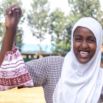 SAG Kit Distribution image showing DEB Muslim School girls receiving 406 kits in Nyeri, Kenya on Feb 15, 2022