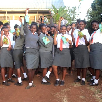 SAG Kit Distribution image showing Kanjuu Secondary School girls receiving 92 kits in Ngariama, Kenya on Mar 4, 2022