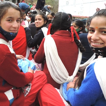 SAG Kit Distribution image showing Village and Area Schools girls receiving 140 kits in Kareri, India on Mar 5, 2022
