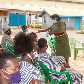 SAG Kit Distribution image showing Kingongo Prison girls receiving 250 kits in Nyeri, Kenya on Mar 25, 2022