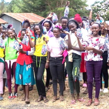 SAG Kit Distribution image showing Kanyagia Area Schools girls receiving 457 kits in Kanyagia, Kenya on Apr 13, 2022