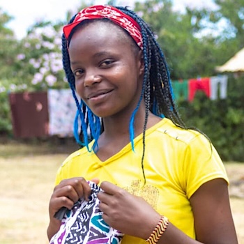 SAG Kit Distribution image showing Kanyagia Area Schools girls receiving 457 kits in Kanyagia, Kenya on Apr 13, 2022