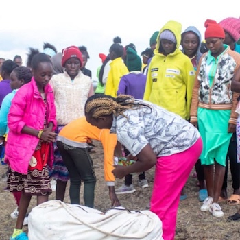 SAG Kit Distribution image showing Kabati Area Schools girls receiving 523 kits in Kabati, Kenya on Apr 13, 2022