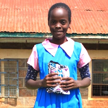 SAG Kit Distribution image showing Kagumo Primary School girls receiving 114 kits in Othaya, Kenya on Jun 2, 2022