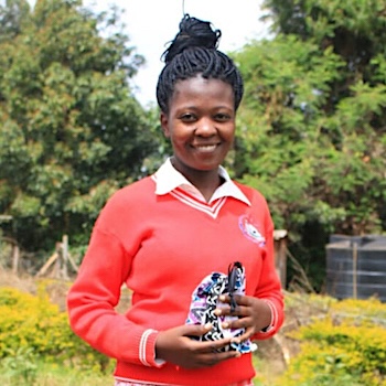 SAG Kit Distribution image showing Kagumo Secondary School girls receiving 163 kits in Othaya, Kenya on Jun 2, 2022