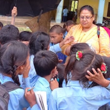 SAG Kit Distribution image showing Jhinghni Secondary School girls receiving 250 kits in Jhinghni, Nepal on Jun 20, 2022