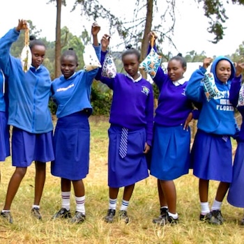 SAG Kit Distribution image showing Kanyama Secondary School girls receiving 318 kits in Karatina, Kenya on Jun 24, 2022