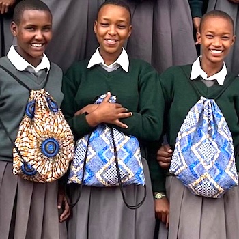 SAG Kit Distribution image showing Loiborsiret Secondary School girls receiving 100 kits in Manyara, Tanzania on Jul 14, 2022