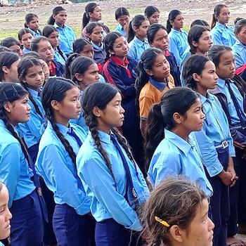SAG Kit Distribution image showing Sudha Secondary School girls receiving 400 kits in Banlachuli, Nepal on Aug 9, 2022