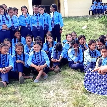 SAG Kit Distribution image showing Mahandra Secondary School girls receiving 350 kits in Banlachuli, Nepal on Aug 9, 2022