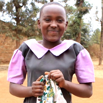 SAG Kit Distribution image showing Thome Primary School girls receiving 165 kits in Thome, Kenya on Aug 23, 2022